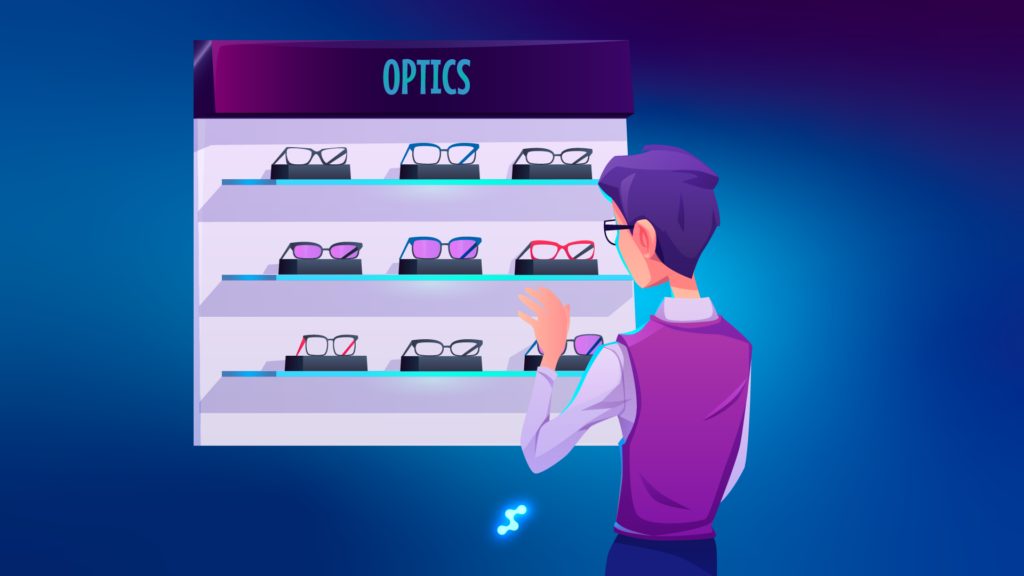 Cliente a ver expositores de óculos numa ótica independente