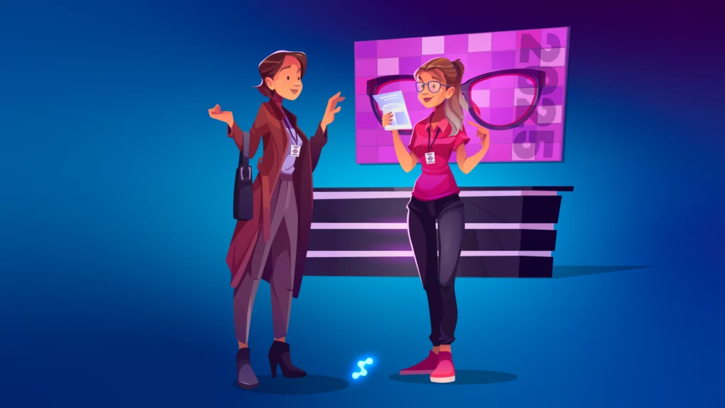 Optical trade show staff talking at eyewear industry event