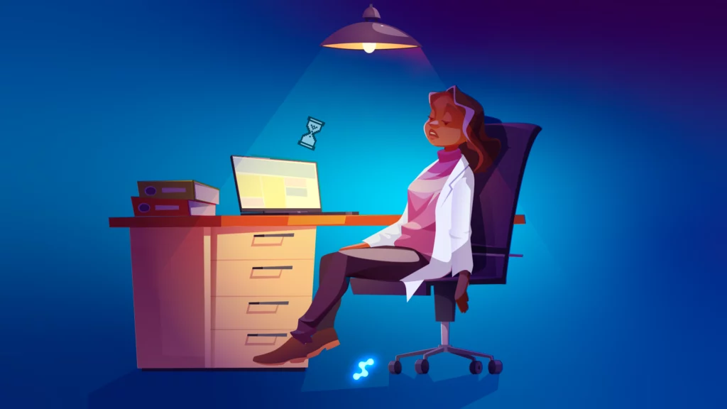 Tired optometrist at desk with laptop and outdated office systems